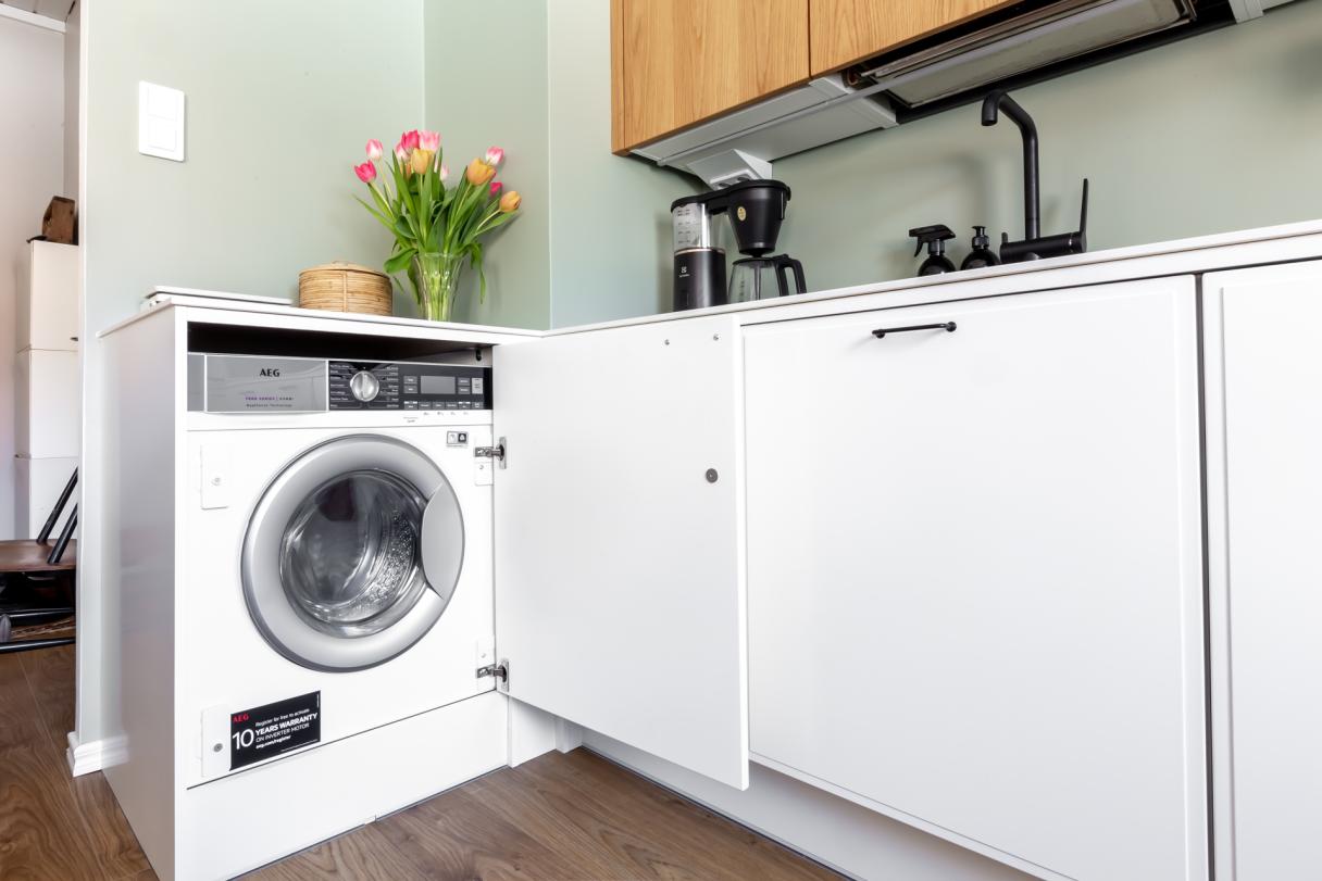 Puustelli saareke keittiö tammiviilu suorakeilaus pesukone